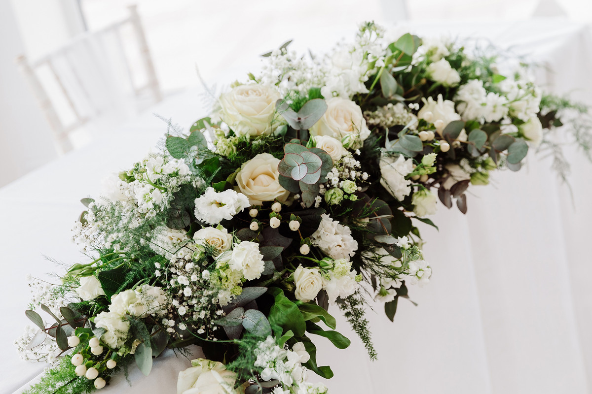 Wedding table flowers at Blithfield Lakeside Barns