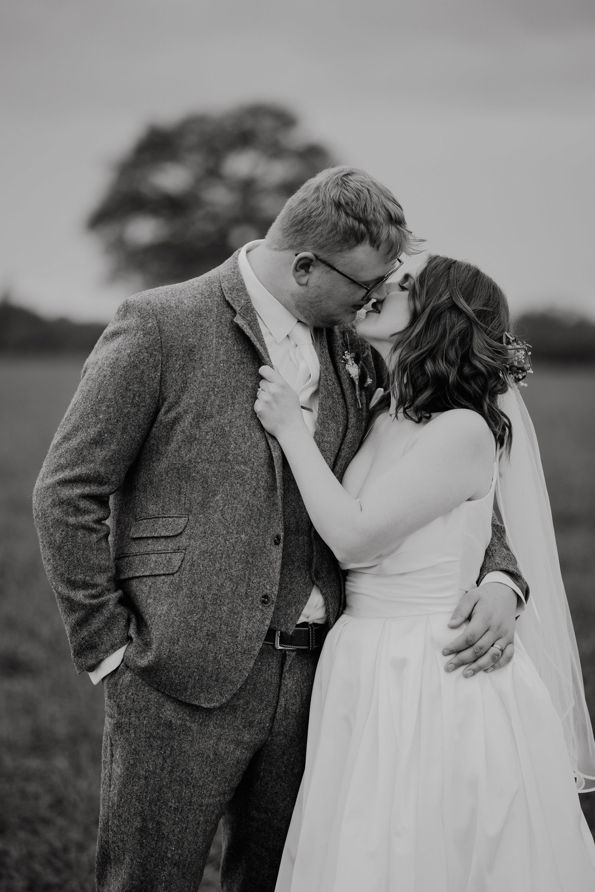 Romantic photograph of bride and groom at Hanbury Wedding Barn