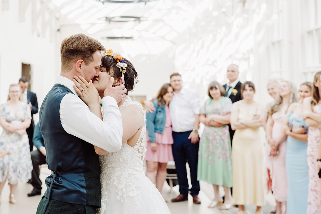 Bride and groom kiss during first dance at The orangery Ingestre