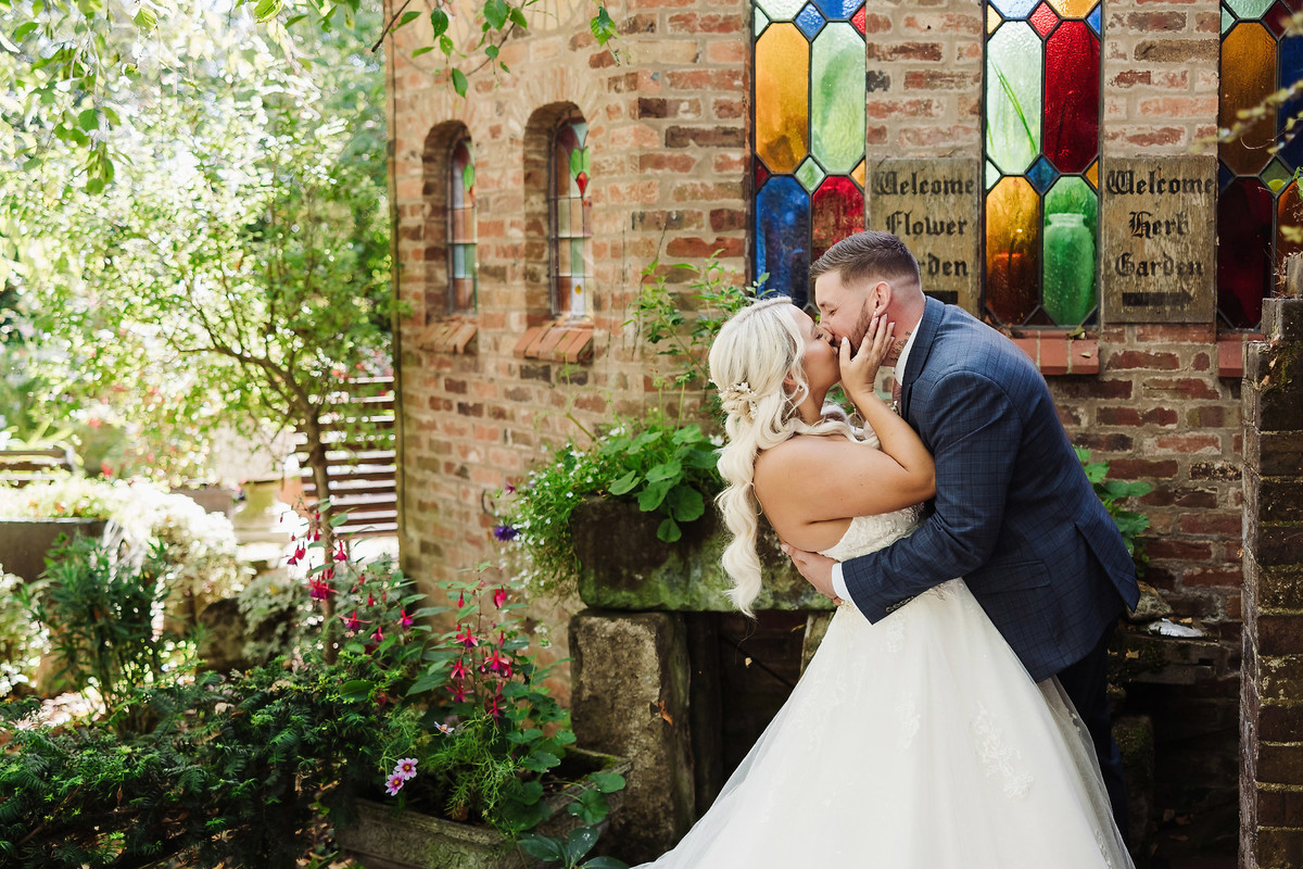 Natural wedding portraits in the gardens at The Hundred House Hotel