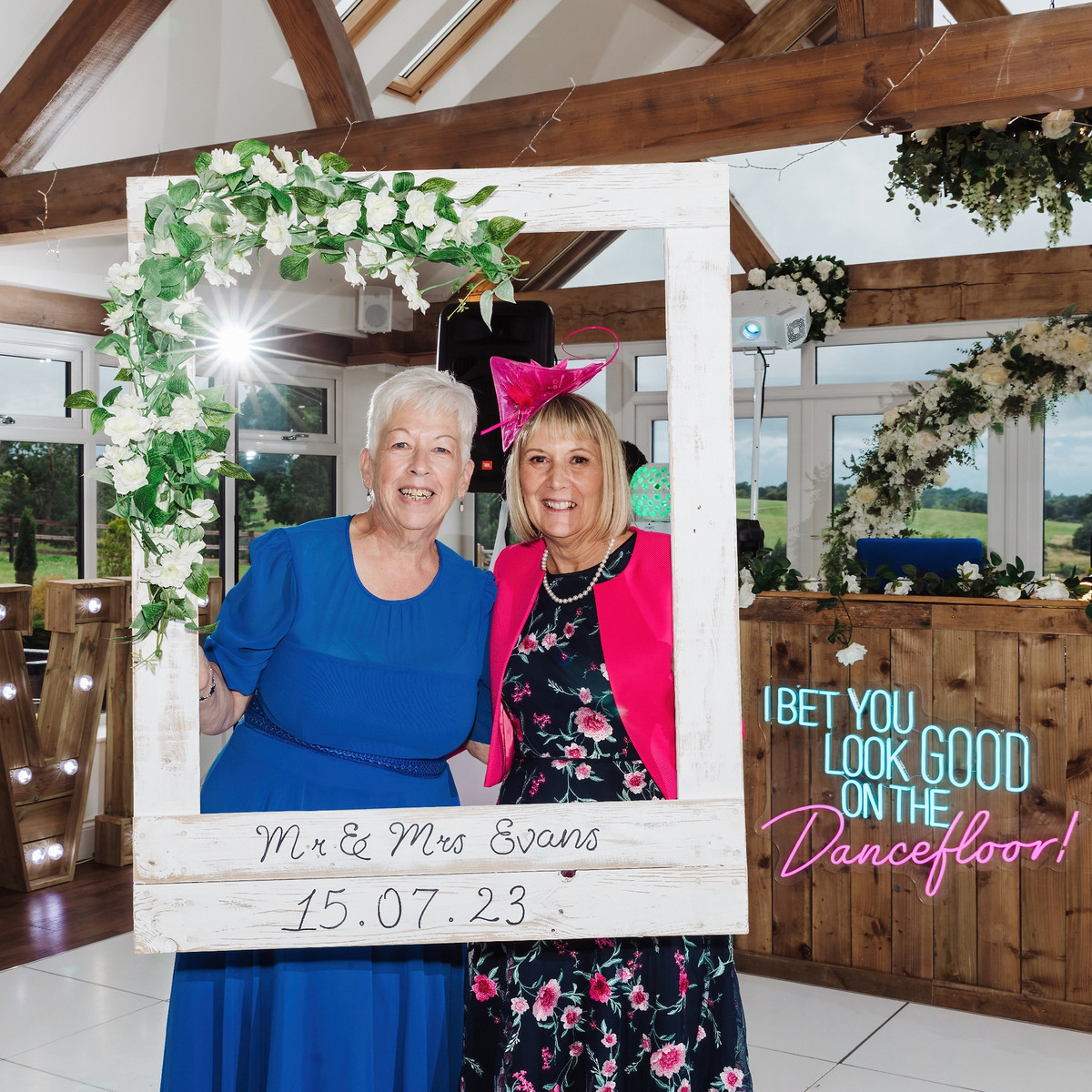 Wedding guests laughing at Blithfield Lakeside Barns