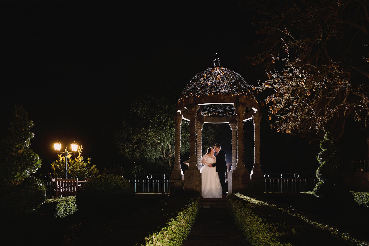 Bride and Groom under the fairy lights at Weston Hall