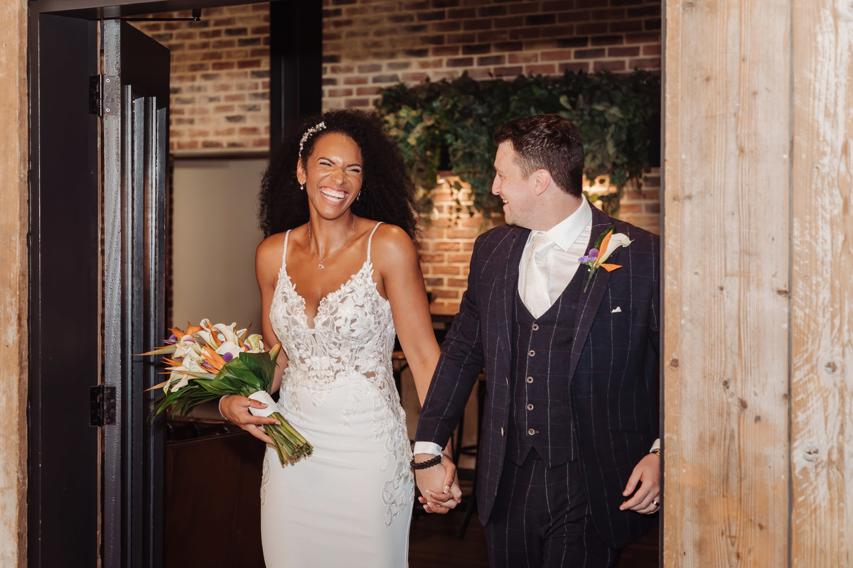 Bride and Groom are announced into their reception at Foxtail Barns wedding