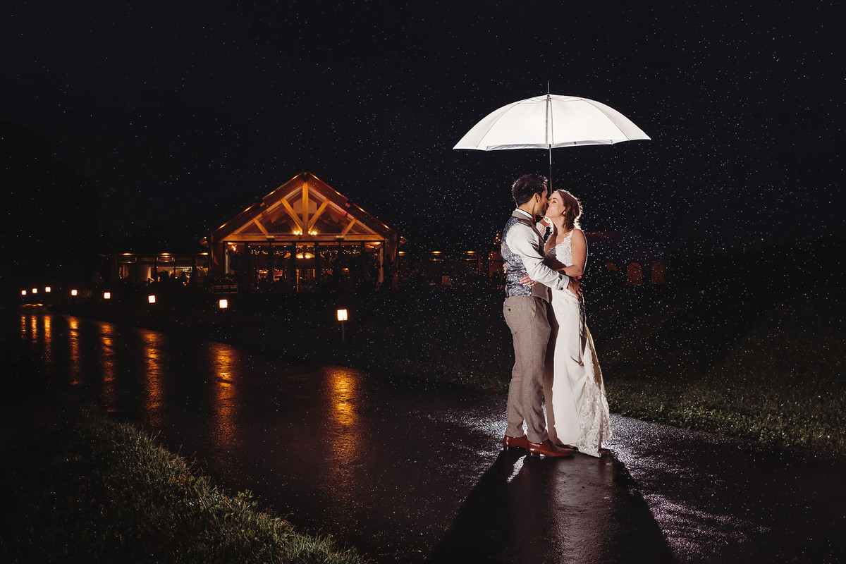 Evening wedding portrait with creative lighting after dark