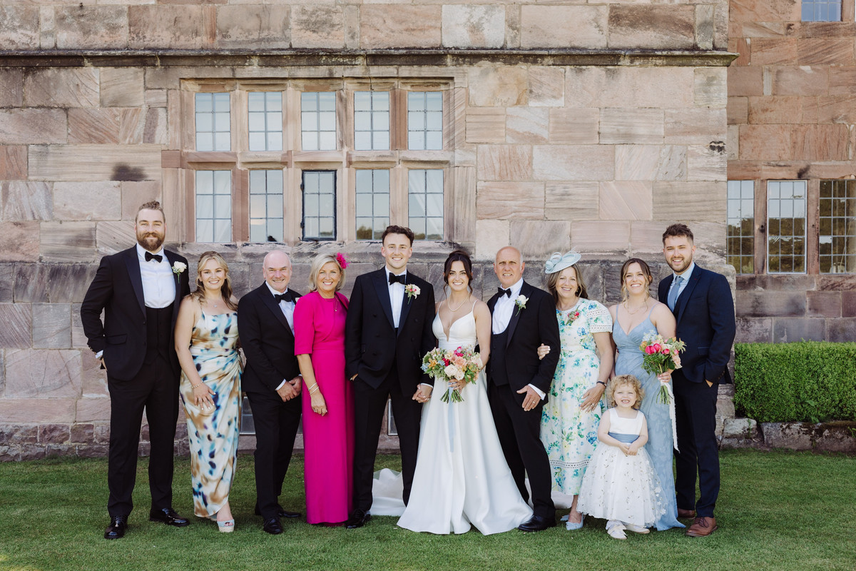 Family group photograph during a relaxed drinks reception