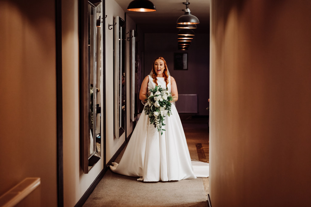 Bride reacts to seeing dad at The Mill Barns