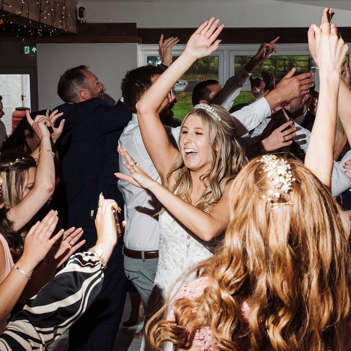 Wedding party and evening celebration at Blithfield Lakeside Barns